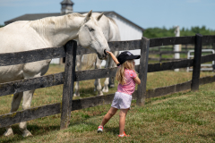 Tyler-with-young-visitor-EA_July_OH1